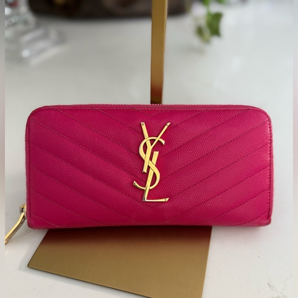 Yves Saint Laurent Handbags - Saint Laurent Paris authentic round zipper long wallet fuchsia pink cowhide
